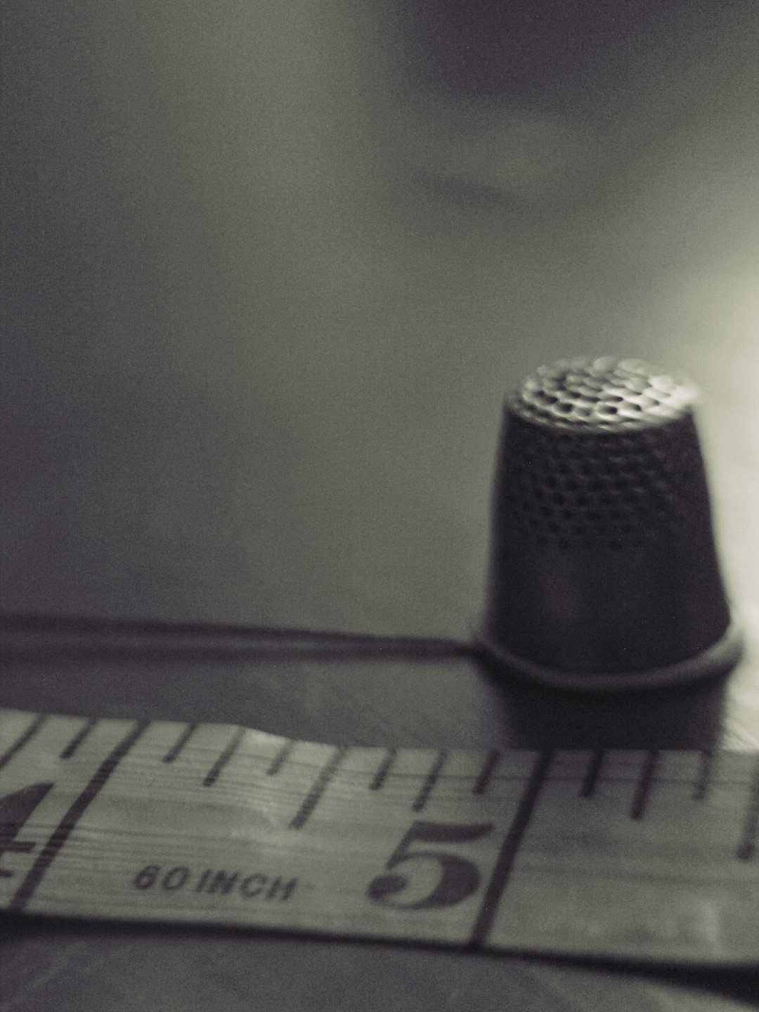gallery-3 vintage-thimble-and-measuring-tape-in-sepia-tones-zekj7mceaq0